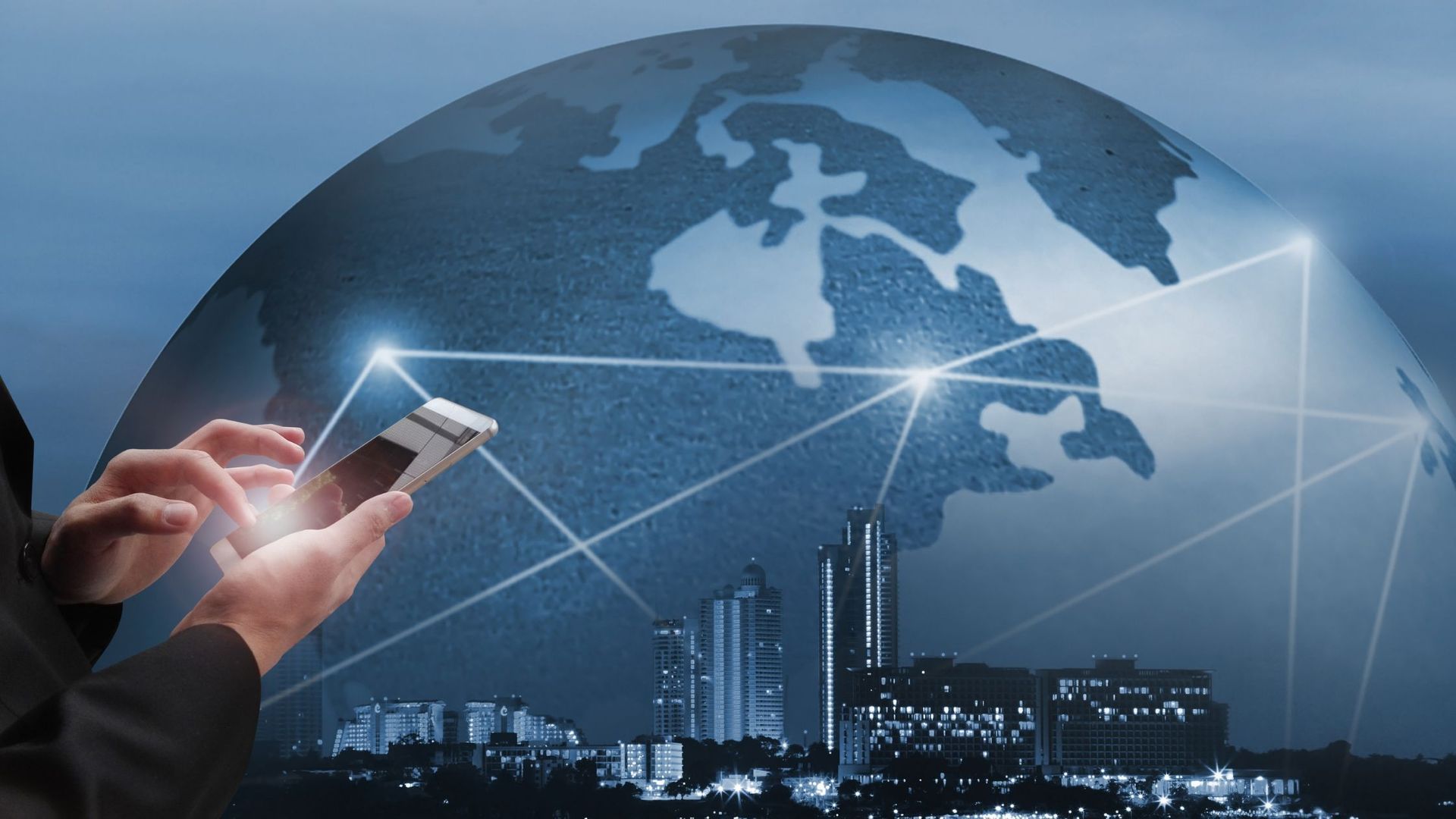Person using a phone, overlaid with a globe and network connections. City skyline in the background.