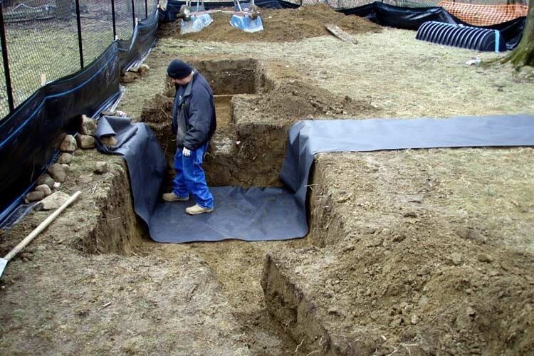 Man Working On Drainage Site — Thornwood, NY — Harry Hudd Architectural Landscapes