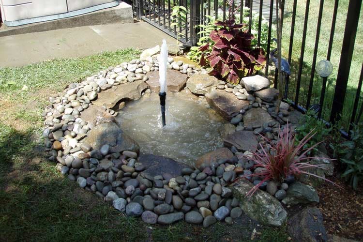 Fountain Surrounded By Stones — Thornwood, NY — Harry Hudd Architectural Landscapes