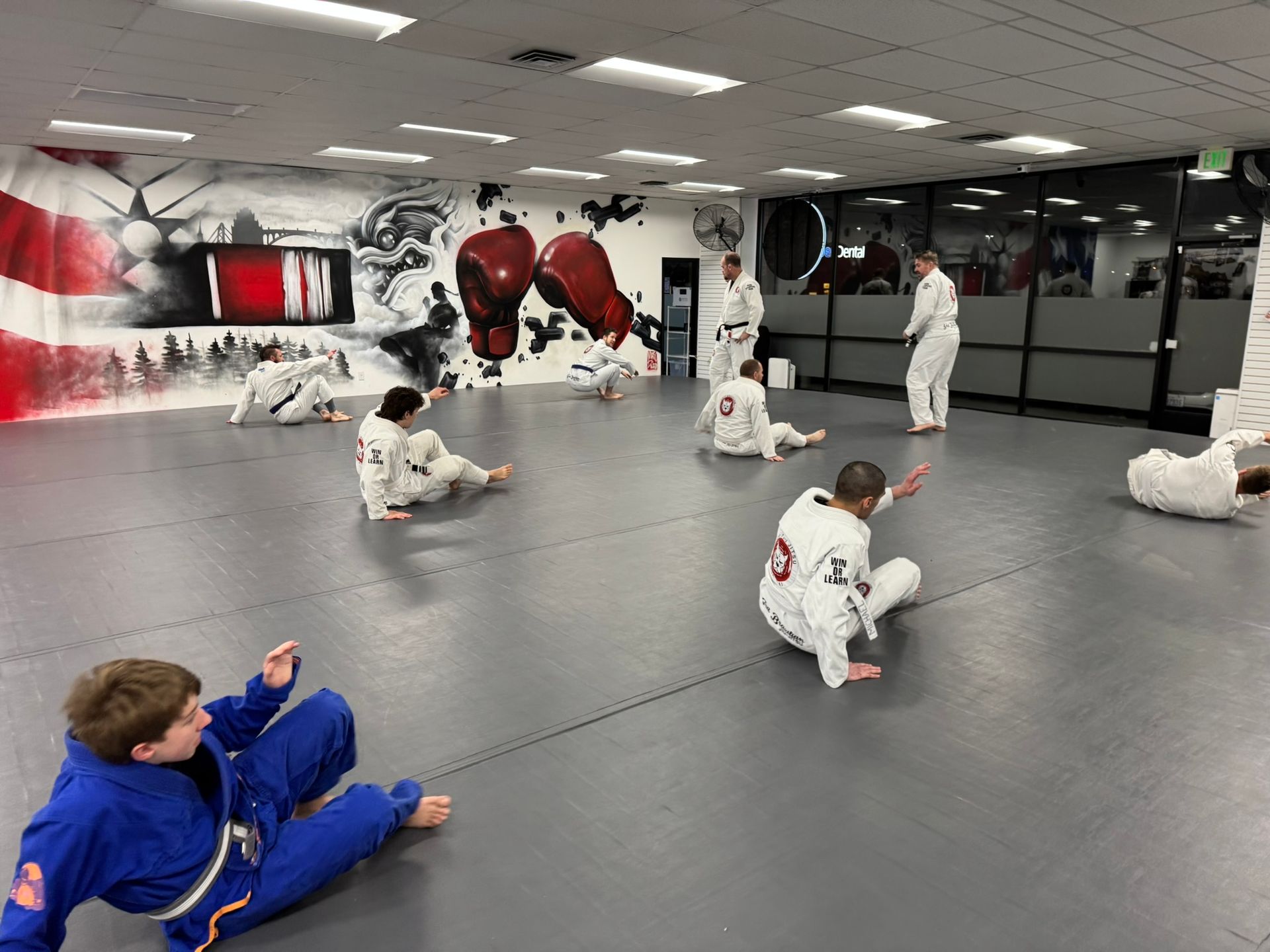 Adult students drilling Jiu-Jitsu fundamentals at Grit Jiu-Jitsu & Muay Thai Martial Arts,
