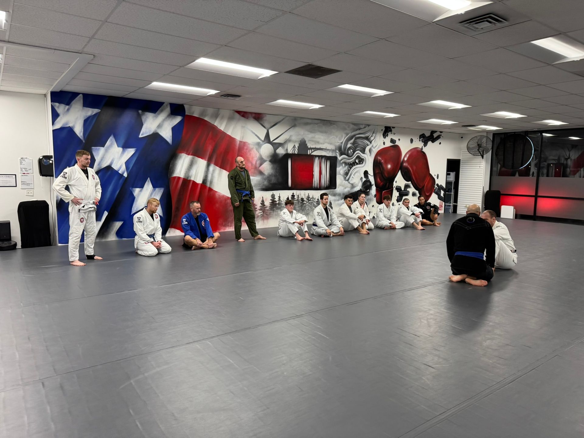 Adults practicing Jiu-Jitsu drills at Grit Jiu-Jitsu & Muay Thai Martial Arts in Spokane Valley, WA 