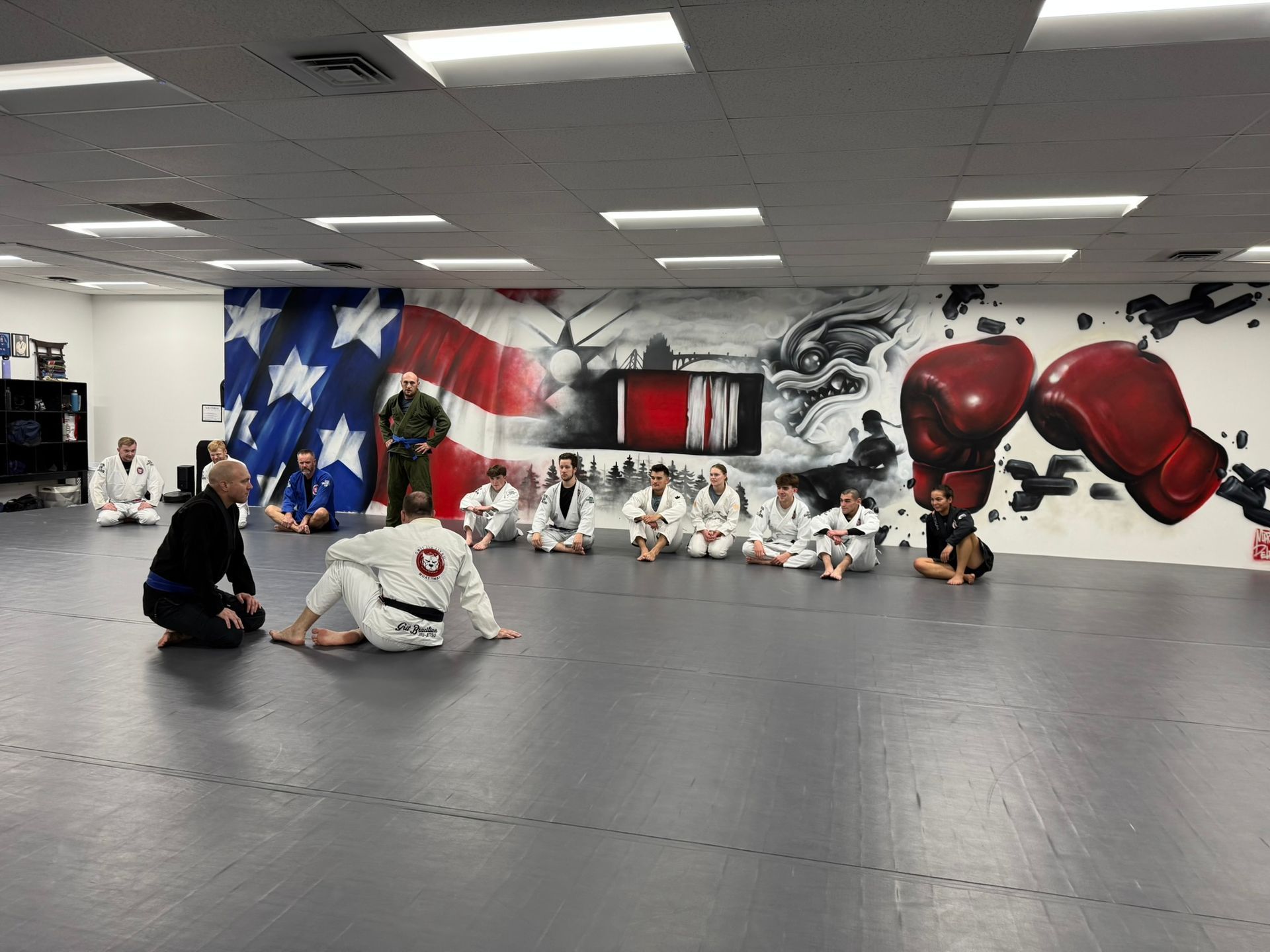 Adults drilling Jiu-Jitsu technique at Grit Jiu-Jitsu & Muay Thai Martial Arts in Spokane Valley, WA