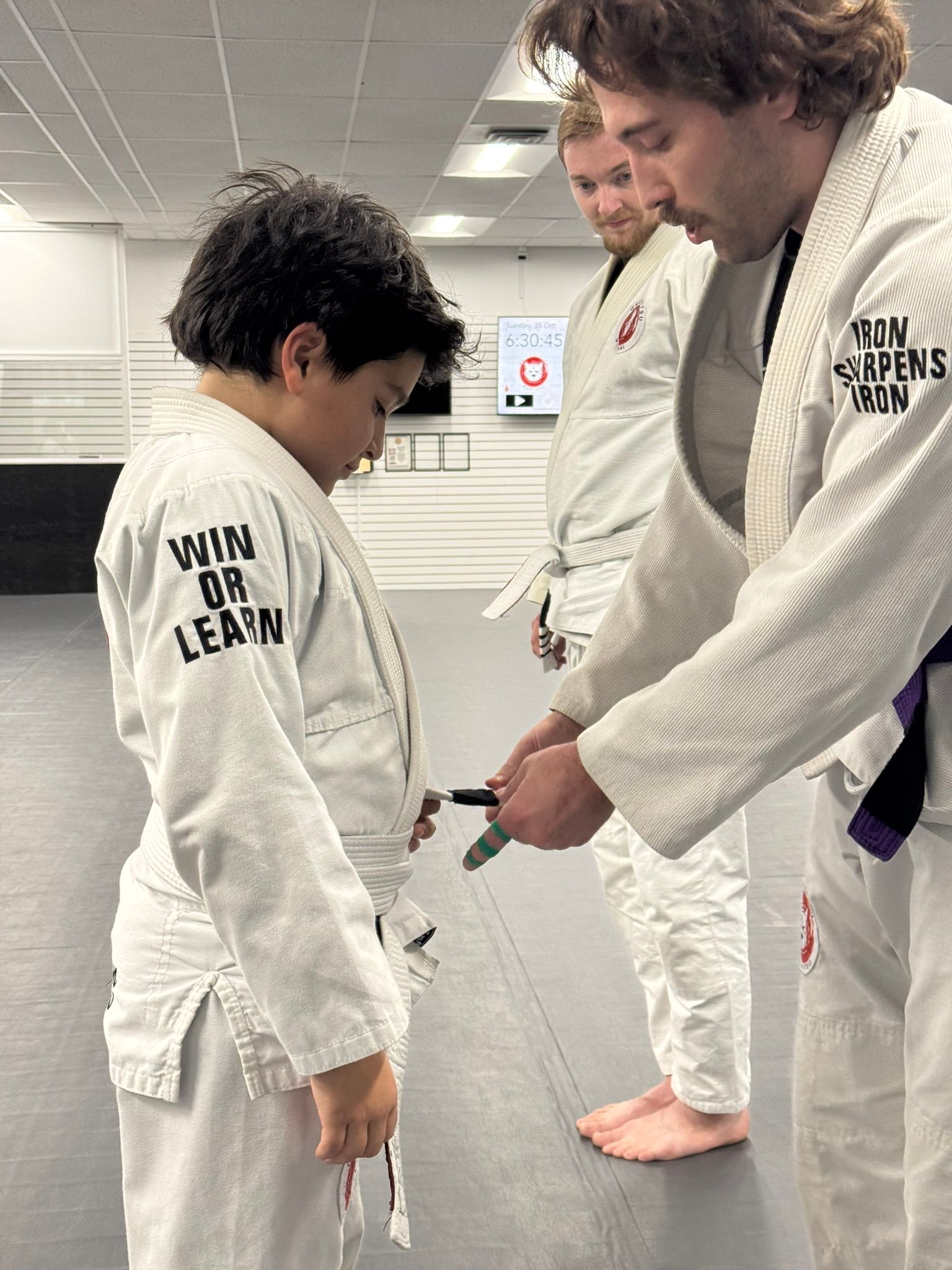 Kids practicing controlled grappling at Grit Jiu-Jitsu & Muay Thai Martial Arts in Spokane Valley.