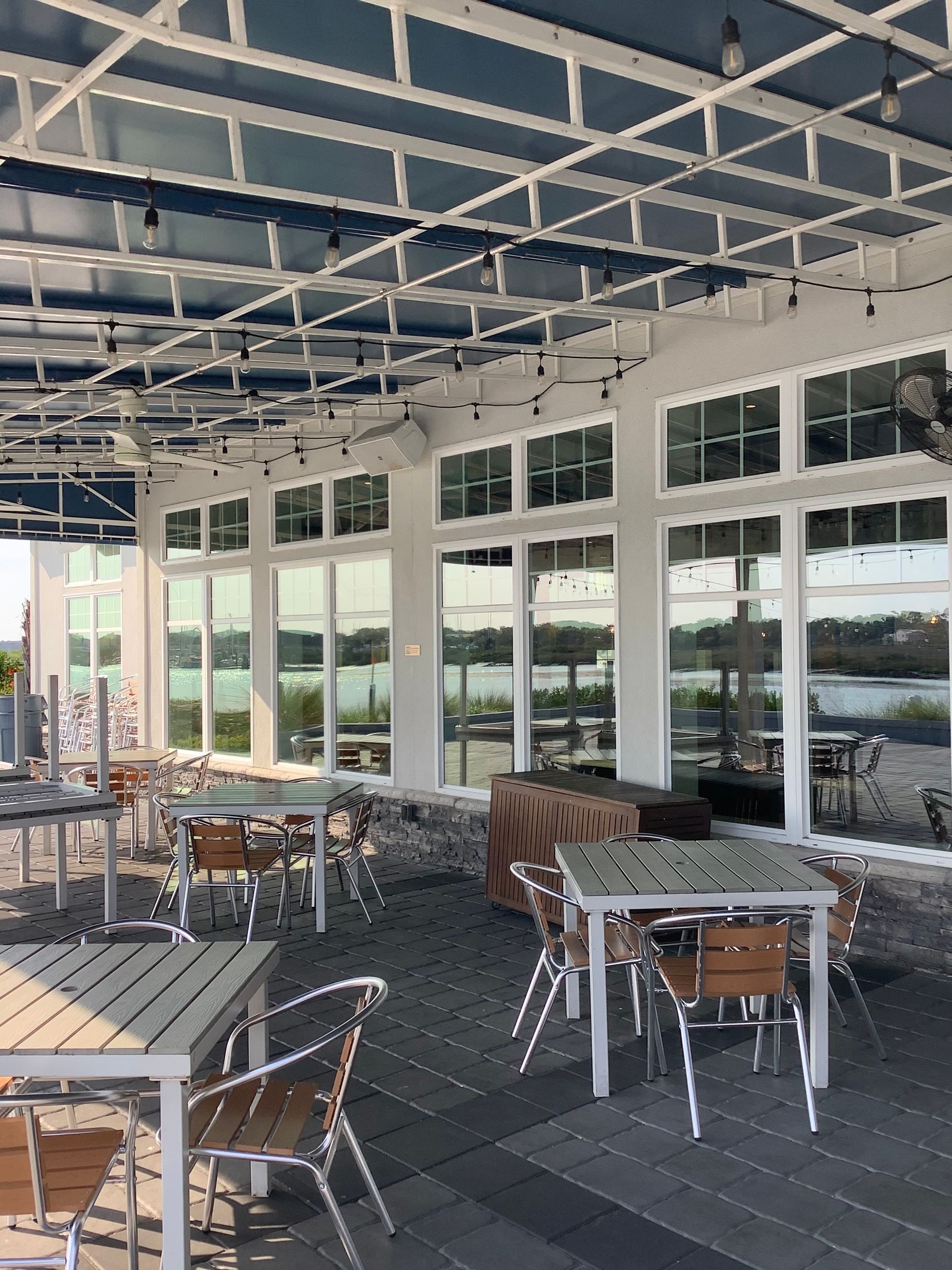 Street entrance covered in salt, melting snow, and tire tracks.