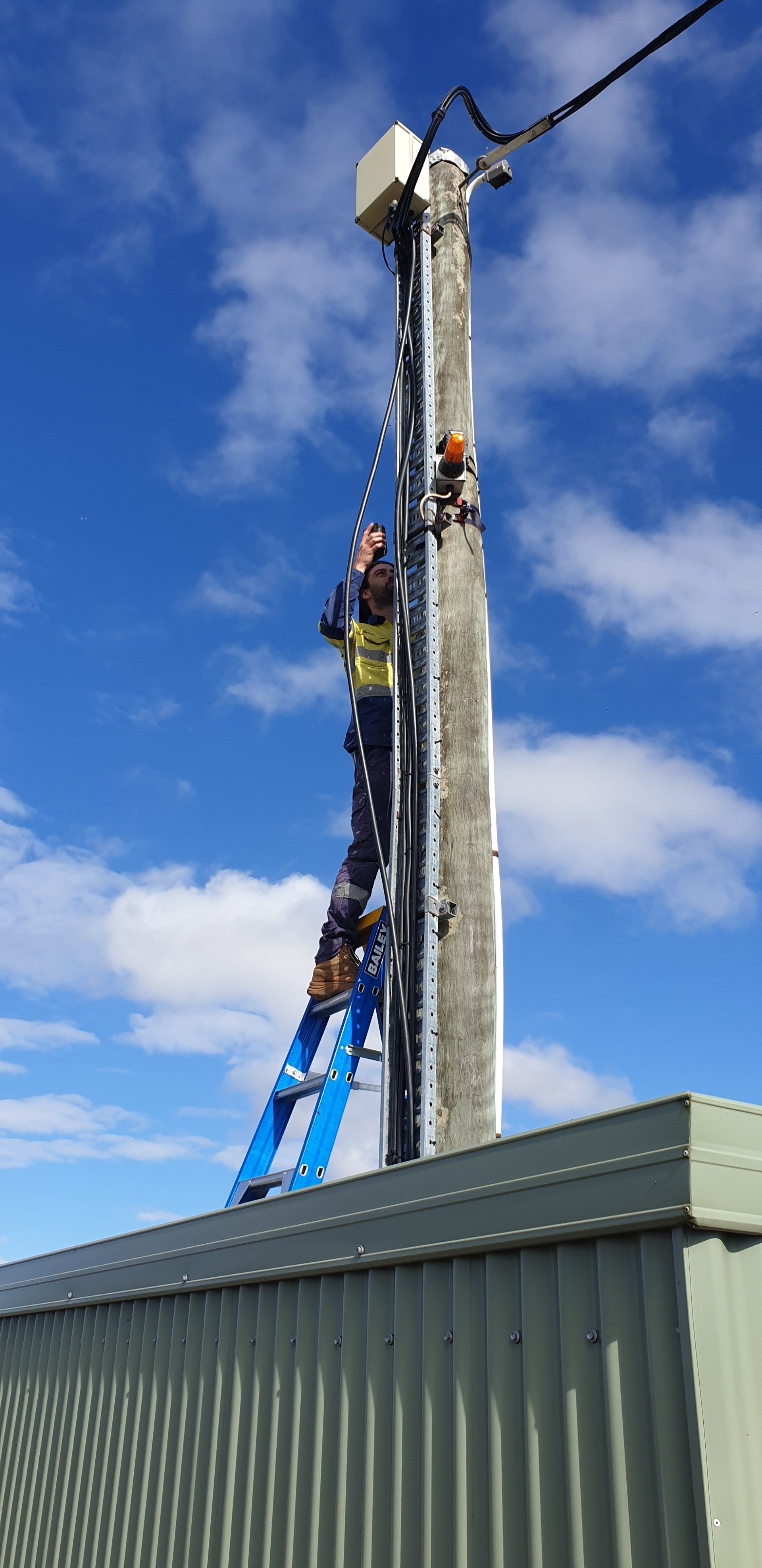 Electrical Pole On Roof — Anytime Cairns Electrical in Cairns, QLD