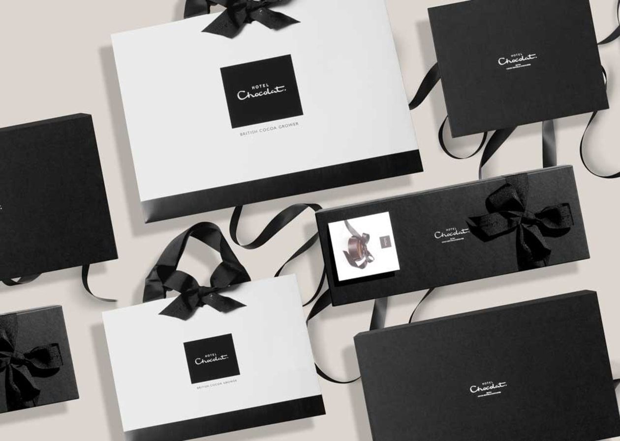 A narrow canal between two buildings in venice at sunset.