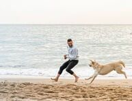 Man running with the dog - Allergy Physicians in Yarmouth Port, MA