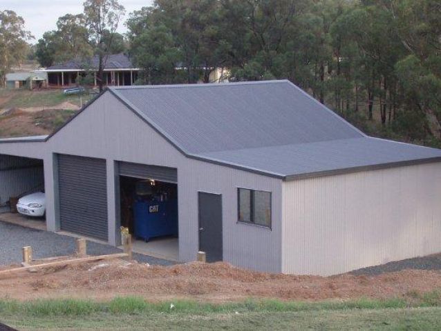 A garage with a car parked inside of it
