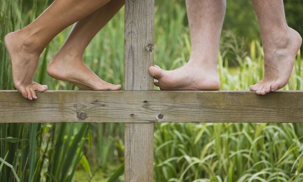Bare feet on a Hawkes Bay farm after fence construction