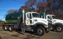 Employee with Trucks, Septic Tank Repair in East Hanover, New Jersey