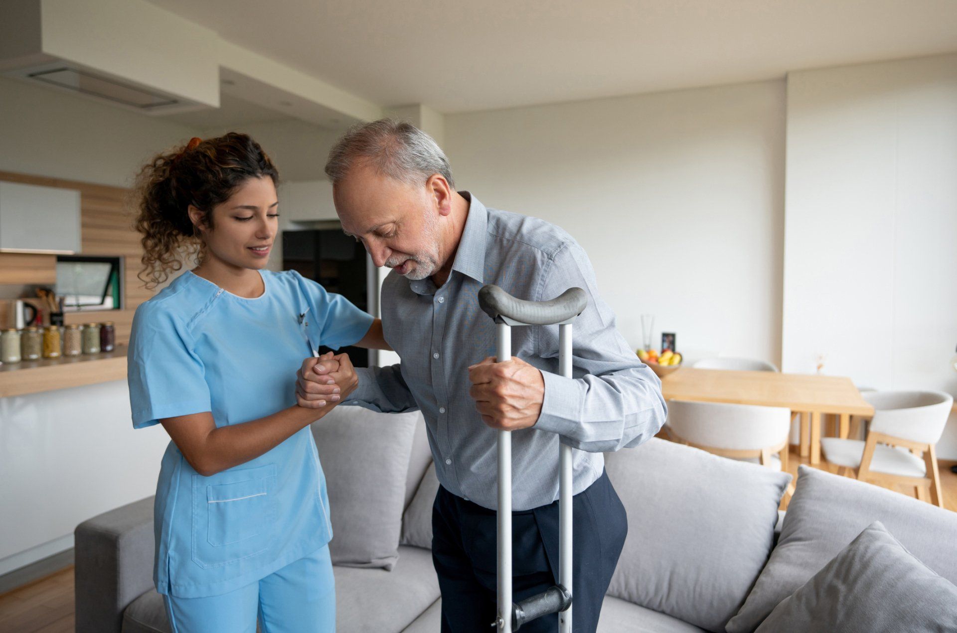Nurse Helping a Senior Man in Crutches — Spokane, WA — Fannin Litigation Group