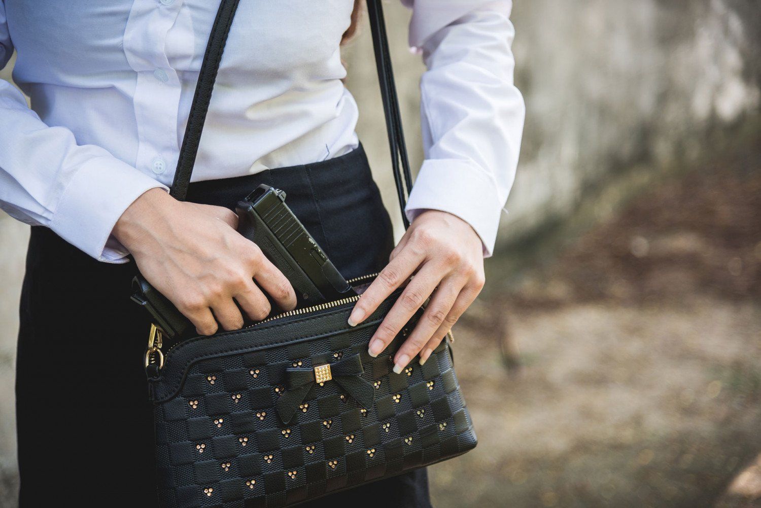 Person Holding A Handgun