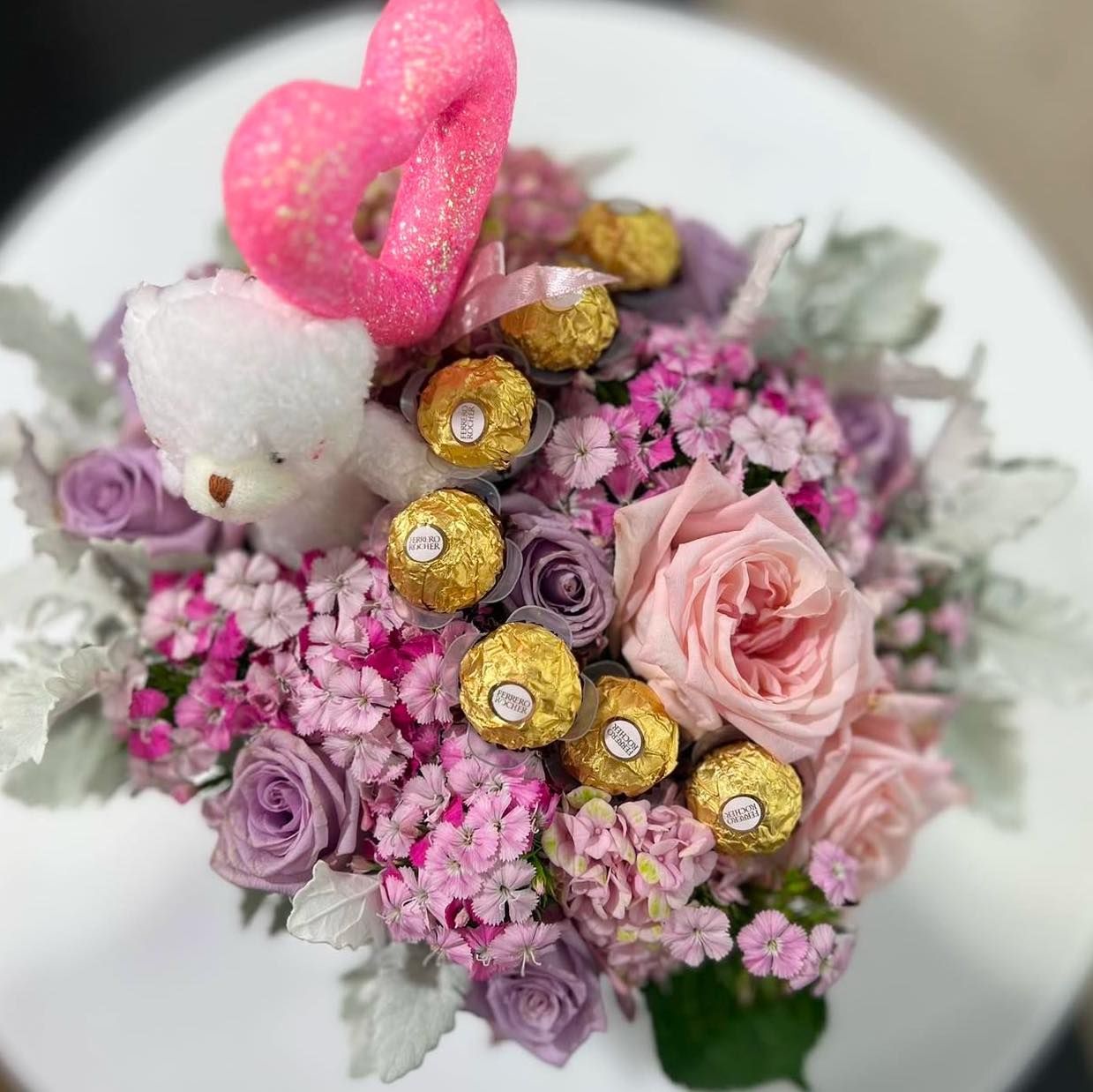A Bouquet of Flowers With a Teddy Bear and a Heart on Top — Florets In Lismore, NSW