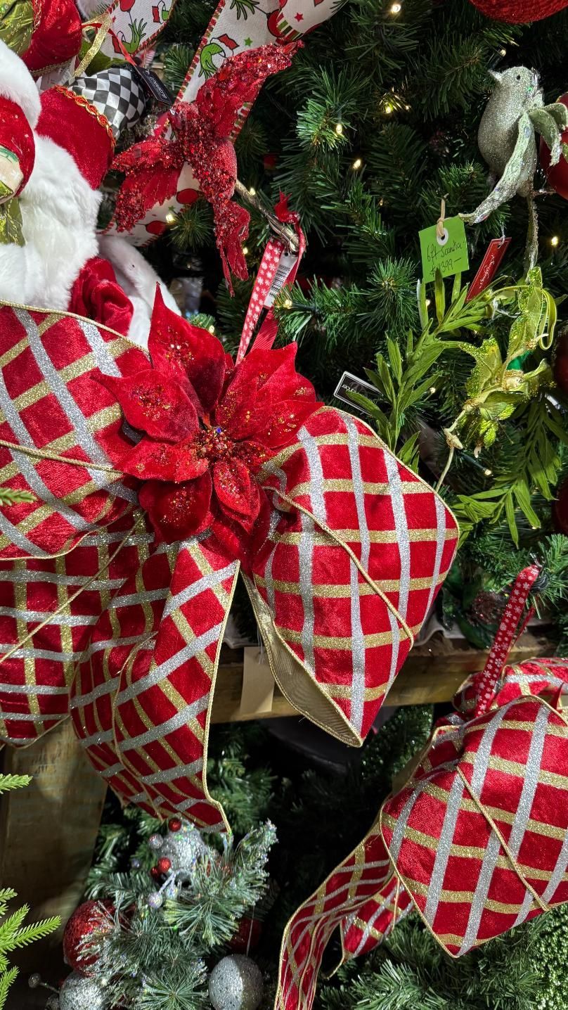 Christmas tree decorated with red and gold diamond patterned ribbon and ornaments. | Jingle Bell Christmas