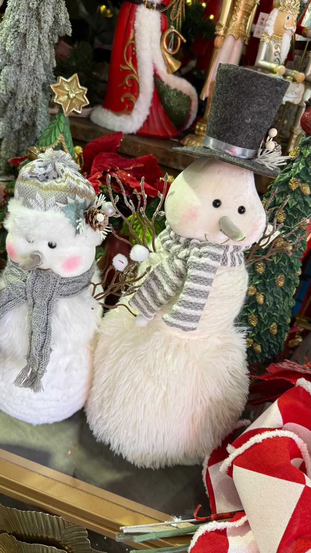 Two fuzzy snowmen wearing scarves, one with a top hat. | Jingle Bell Christmas