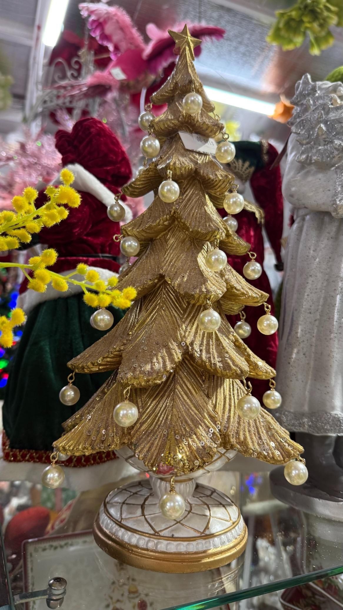 Gold glitter Christmas tree decoration with pearl ornaments, ornate base. | Jingle Bell Christmas