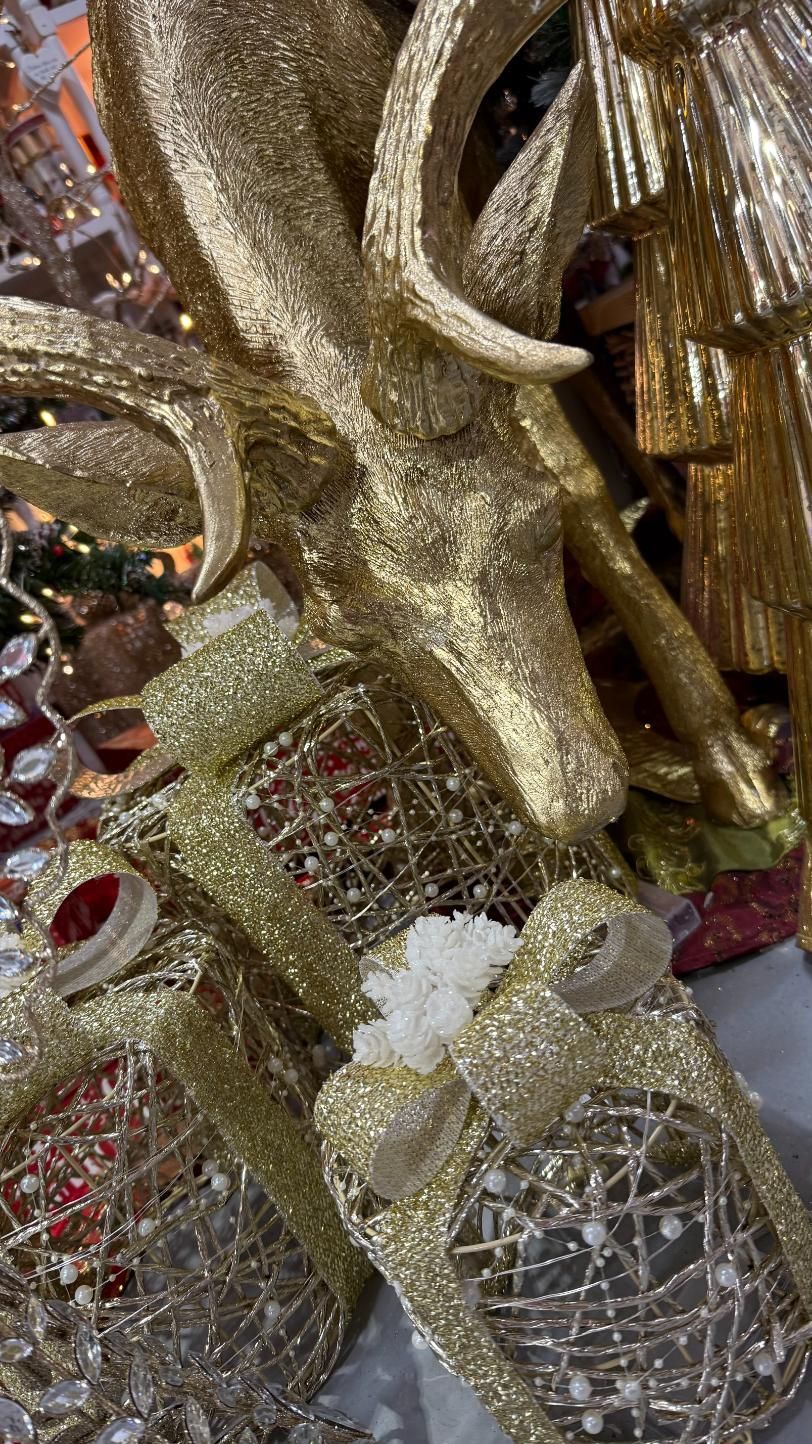 Gold glitter reindeer head and wrapped presents; holiday decoration. | Jingle Bell Christmas