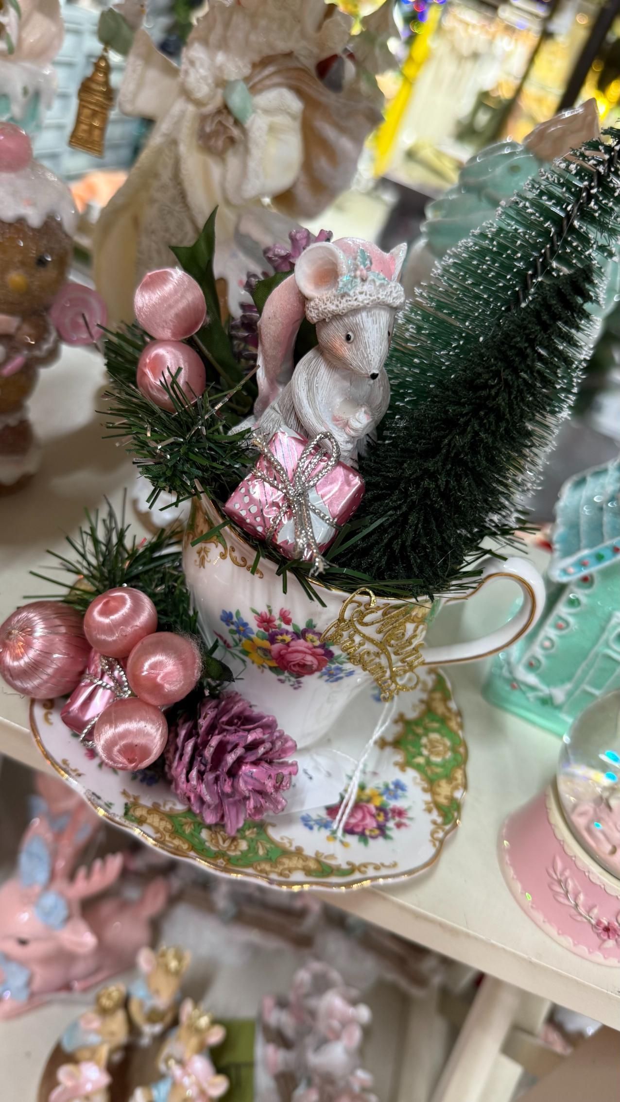 Christmas teacup display with miniature mouse, present, ornaments, and mini tree. | Jingle Bell Christmas