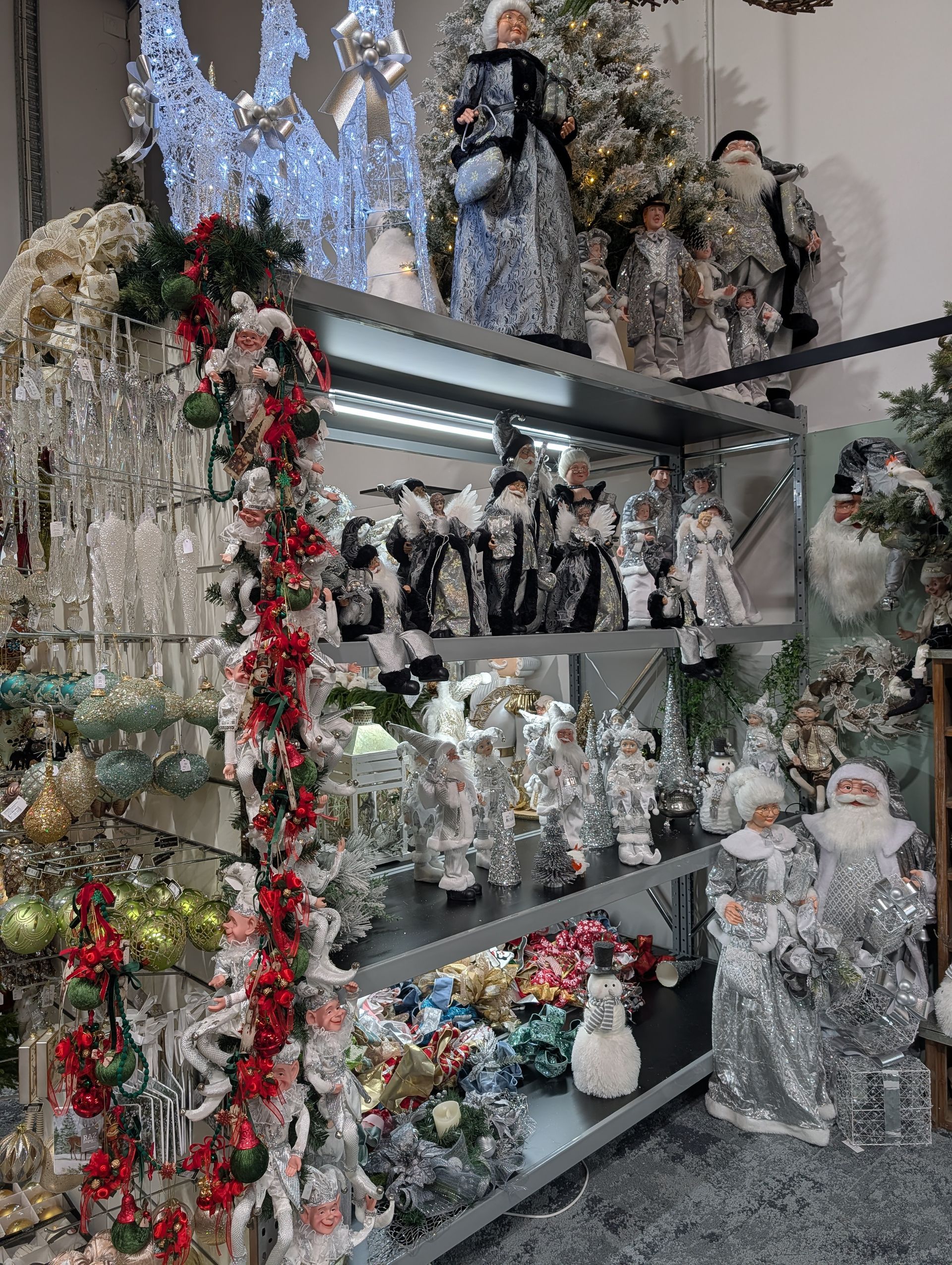 Shelves of Sparkling Silver Christmas Decorations and Garlands in A Festive Shop Display — Jingle Bell Christmas In Casino, NSW