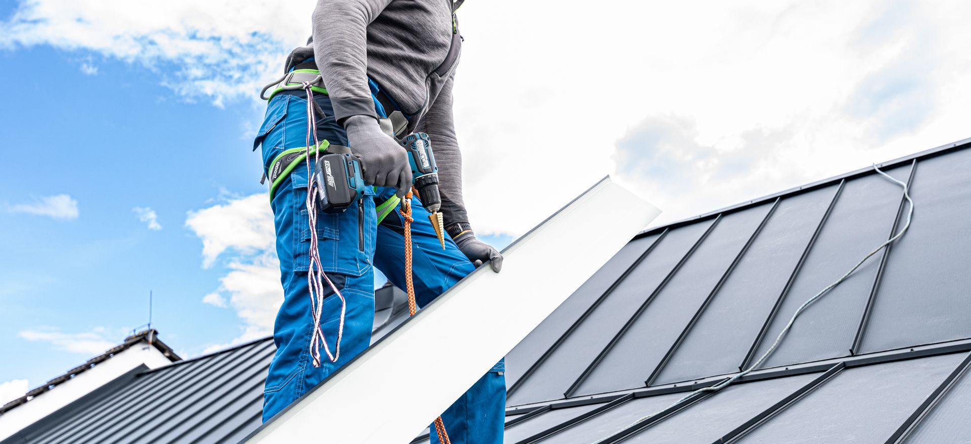 Picture of roofing expert working after getting the Working Safely at Heights Training certification Picture of roofing expert working after getting the Working Safely at Heights Training certification