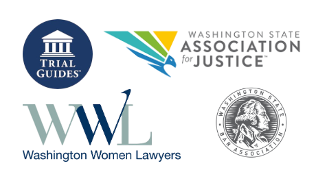 A woman and a child are walking down a sidewalk holding hands.