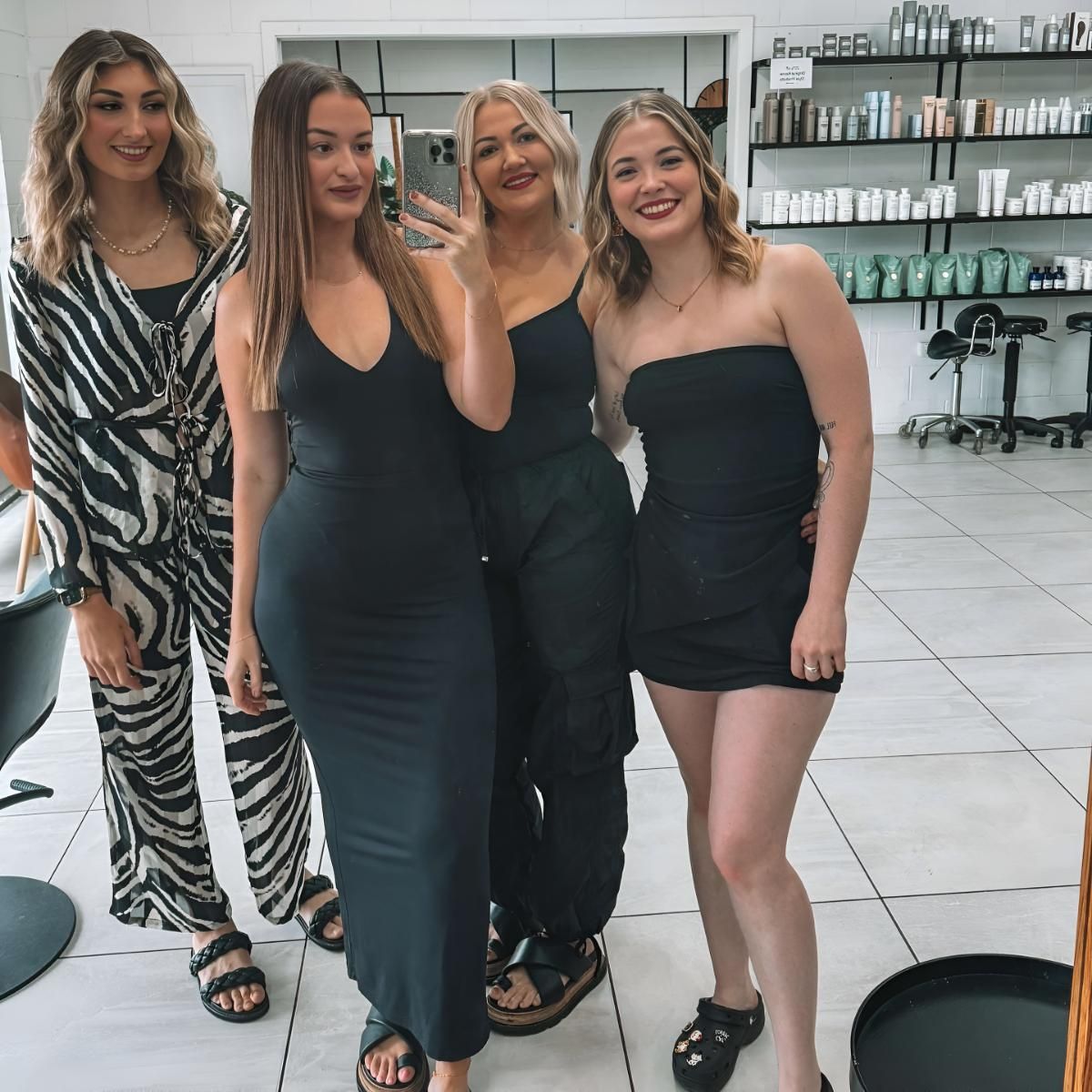A Group Of Women Are Posing For A Picture — Beautique Hair Lounge & Beauty Bar In Condon, QLD