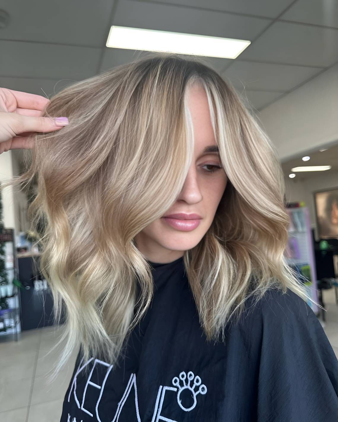 A Woman With Blonde Hair — Beautique Hair Lounge & Beauty Bar In Townsville, QLD