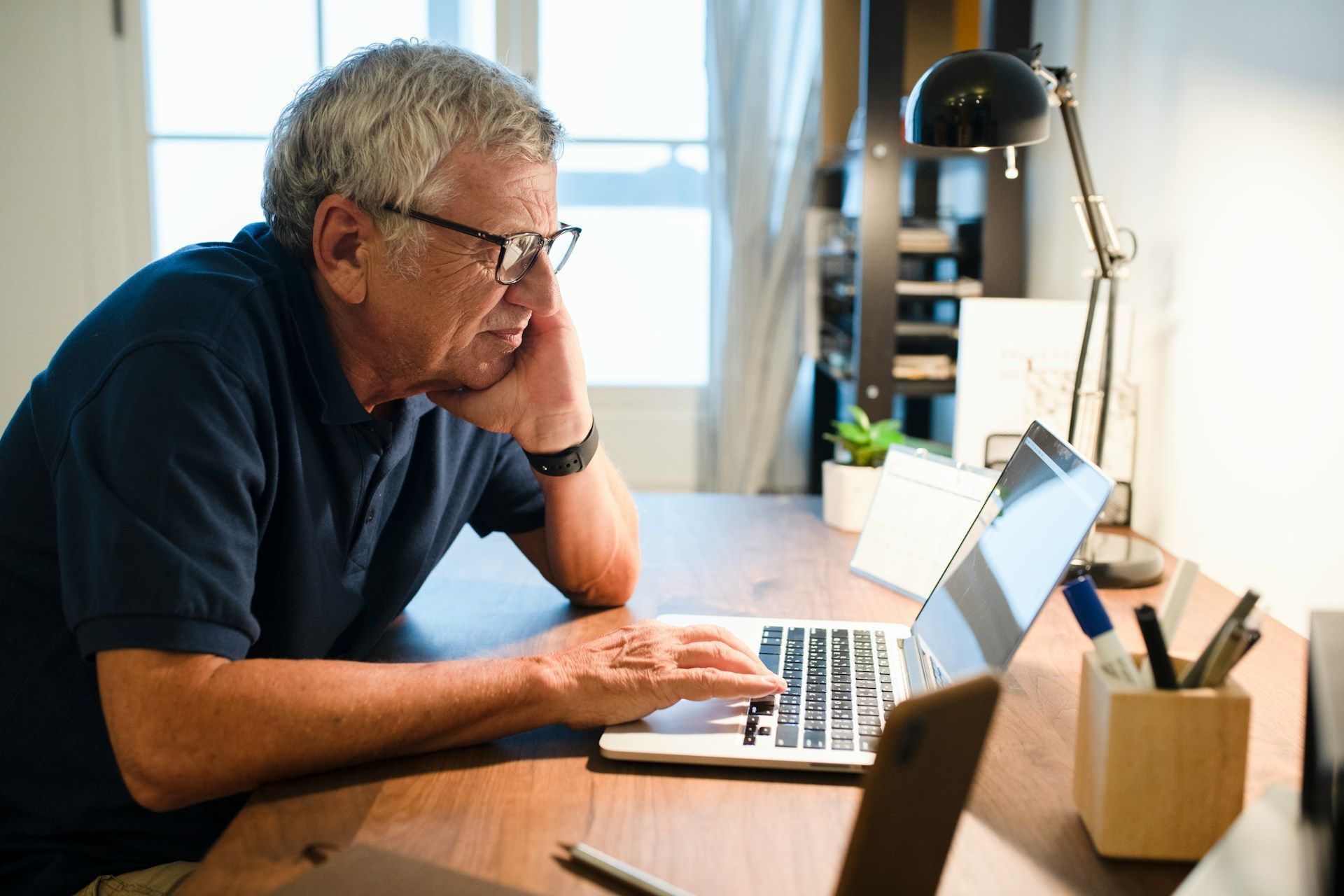 man searching the laptop