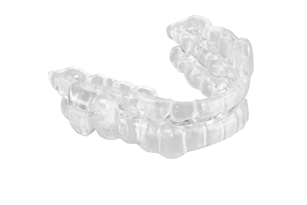 A clear mouth guard is shown on a white background.