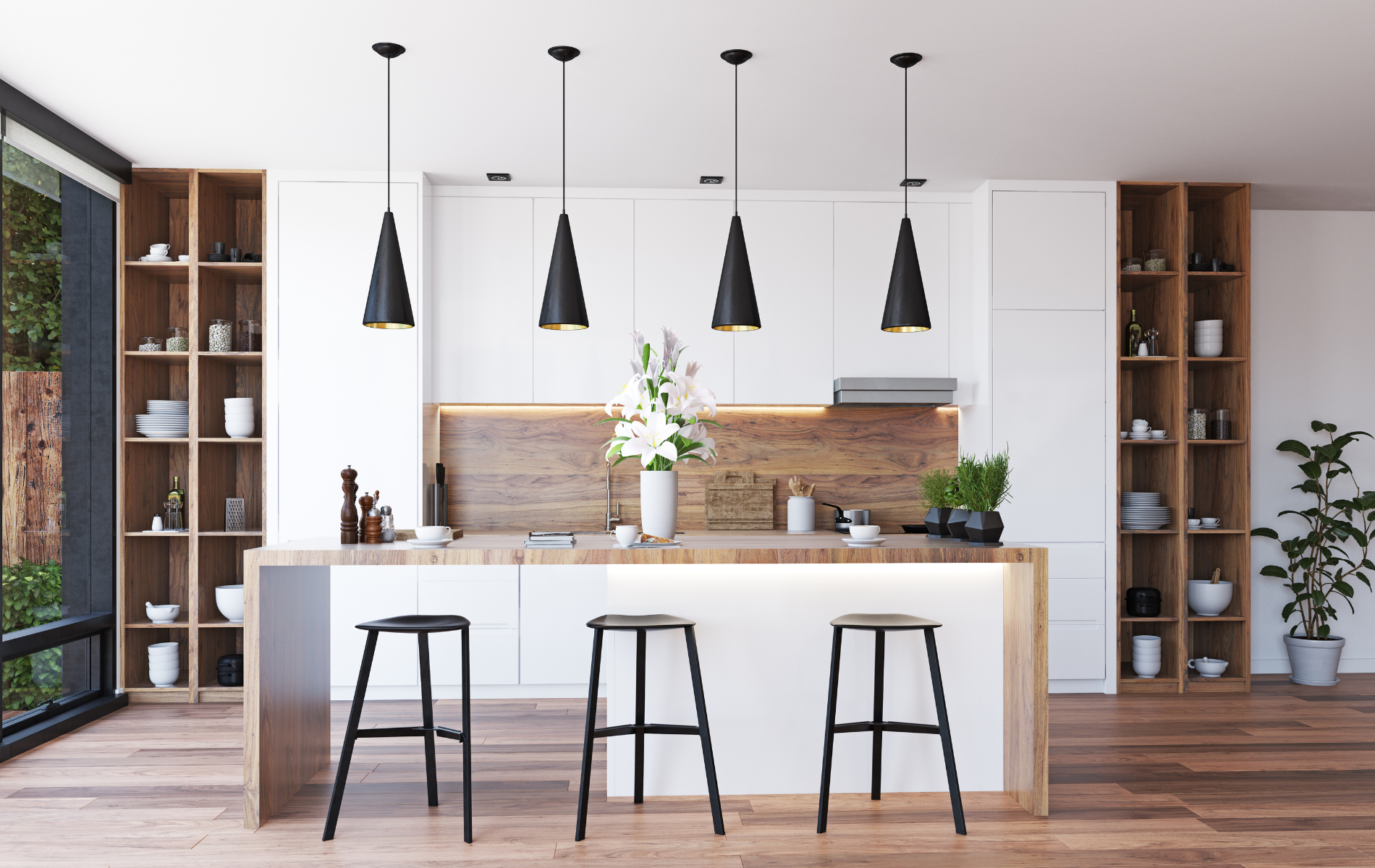 A kitchen with white cabinets , wooden counter tops , stools and a large island.