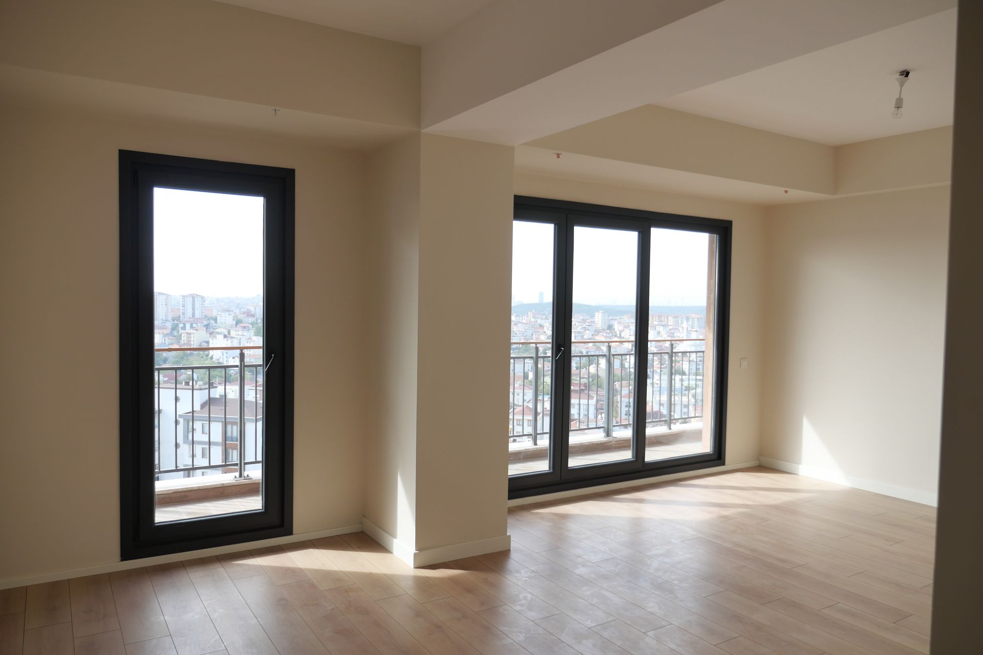 A person is cleaning a car seat with a vacuum cleaner.