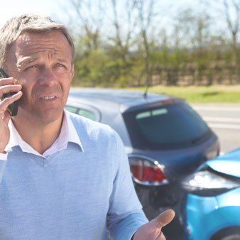 Man On Phone - Auto Insurance in Vinton, VA