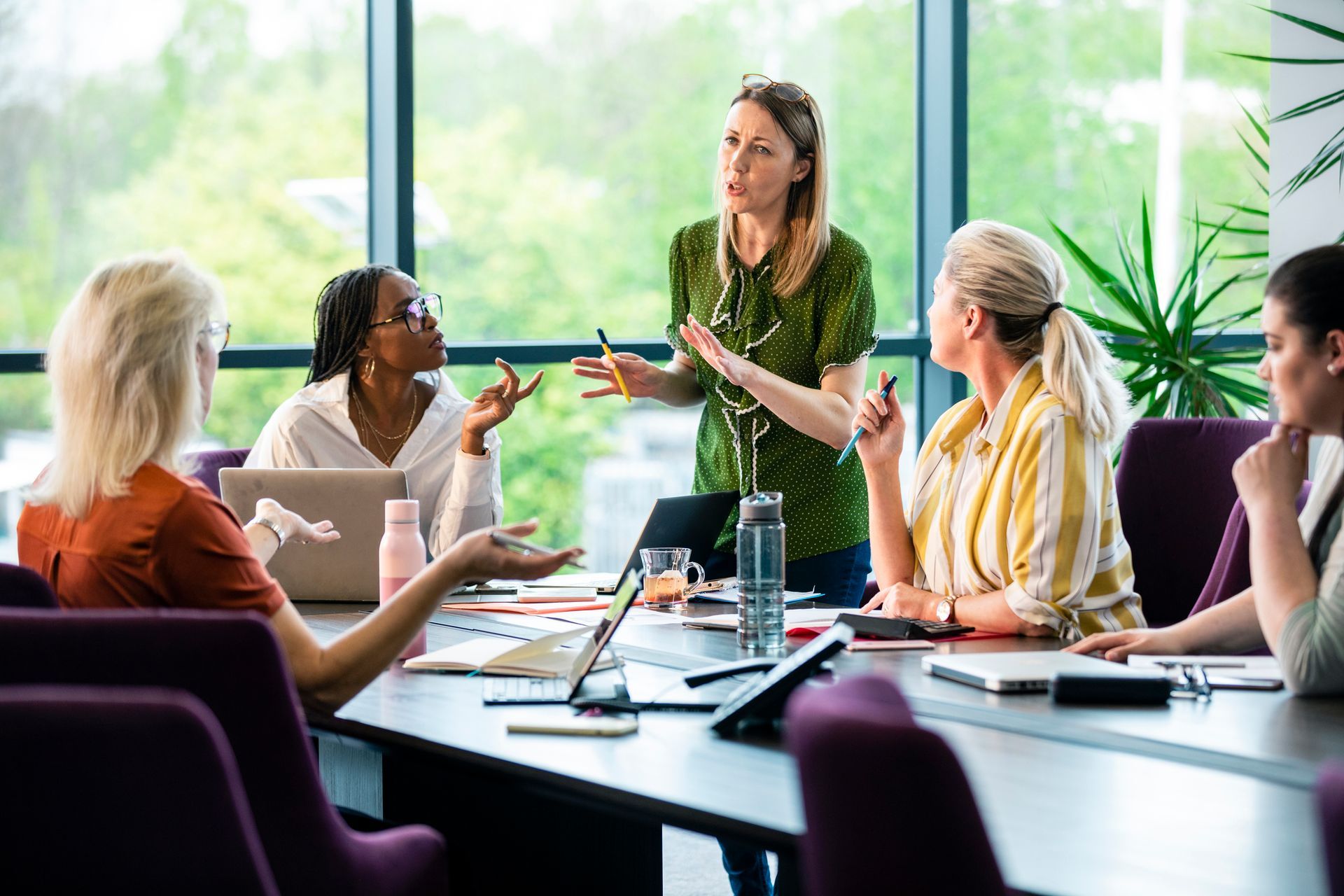 Happy Woman Working with a Laptop — Overland Park, KS — Meta Vida Coaching