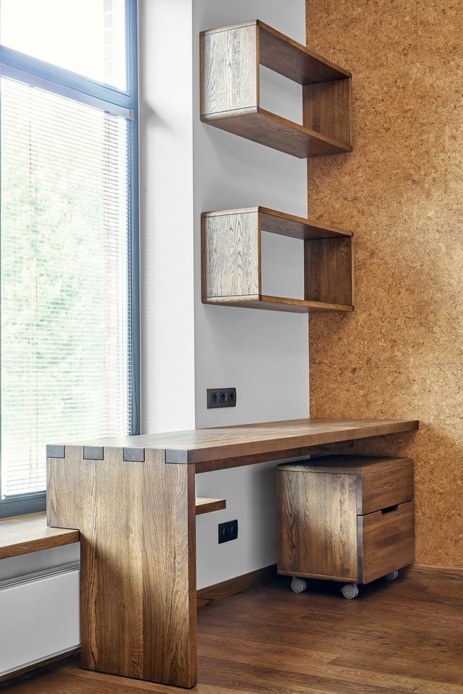 A Wooden Desk And Shelves In A Room Next To A Window — CBY Carpentry & Renovations In Dubbo, NSW