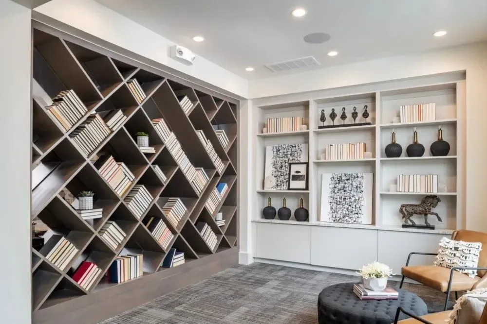 Stylish interior shelving units with decorative books and ornaments
