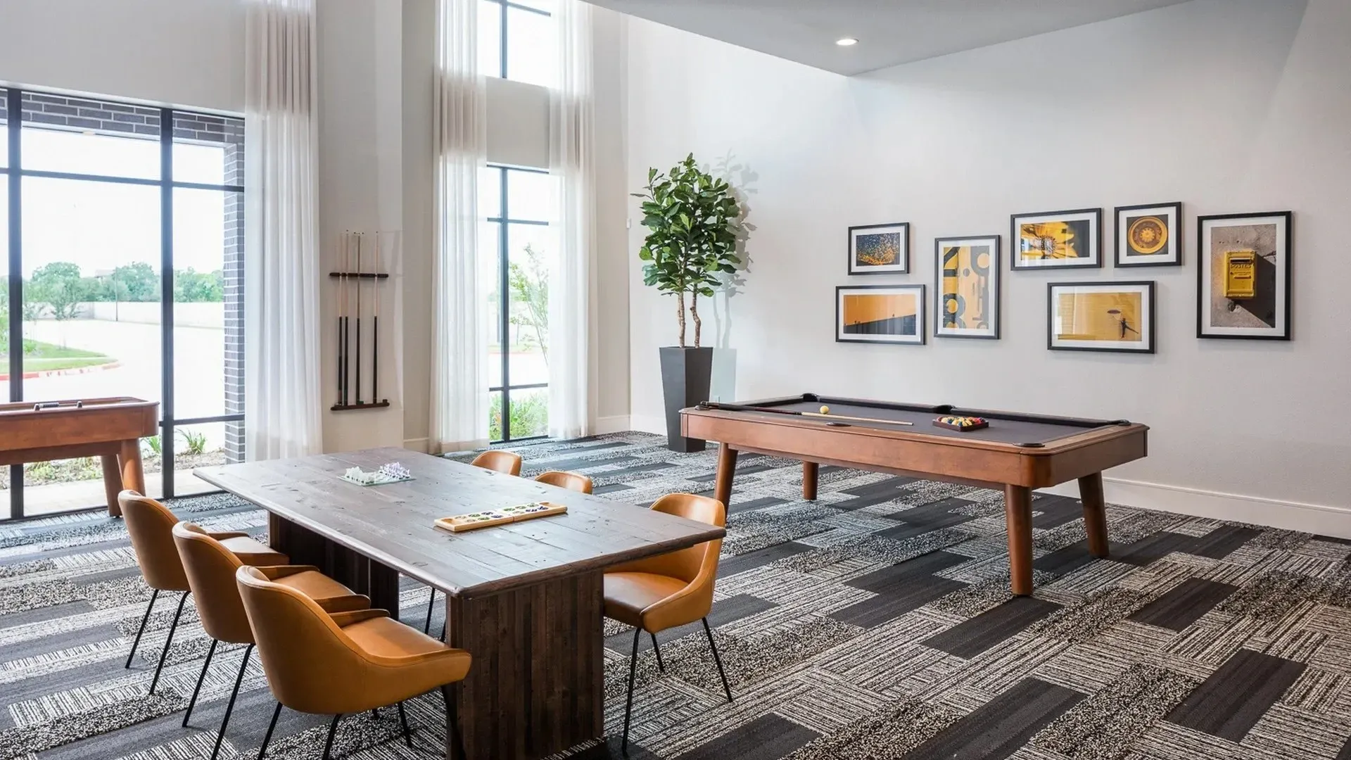 Lounge area with pool table and seating