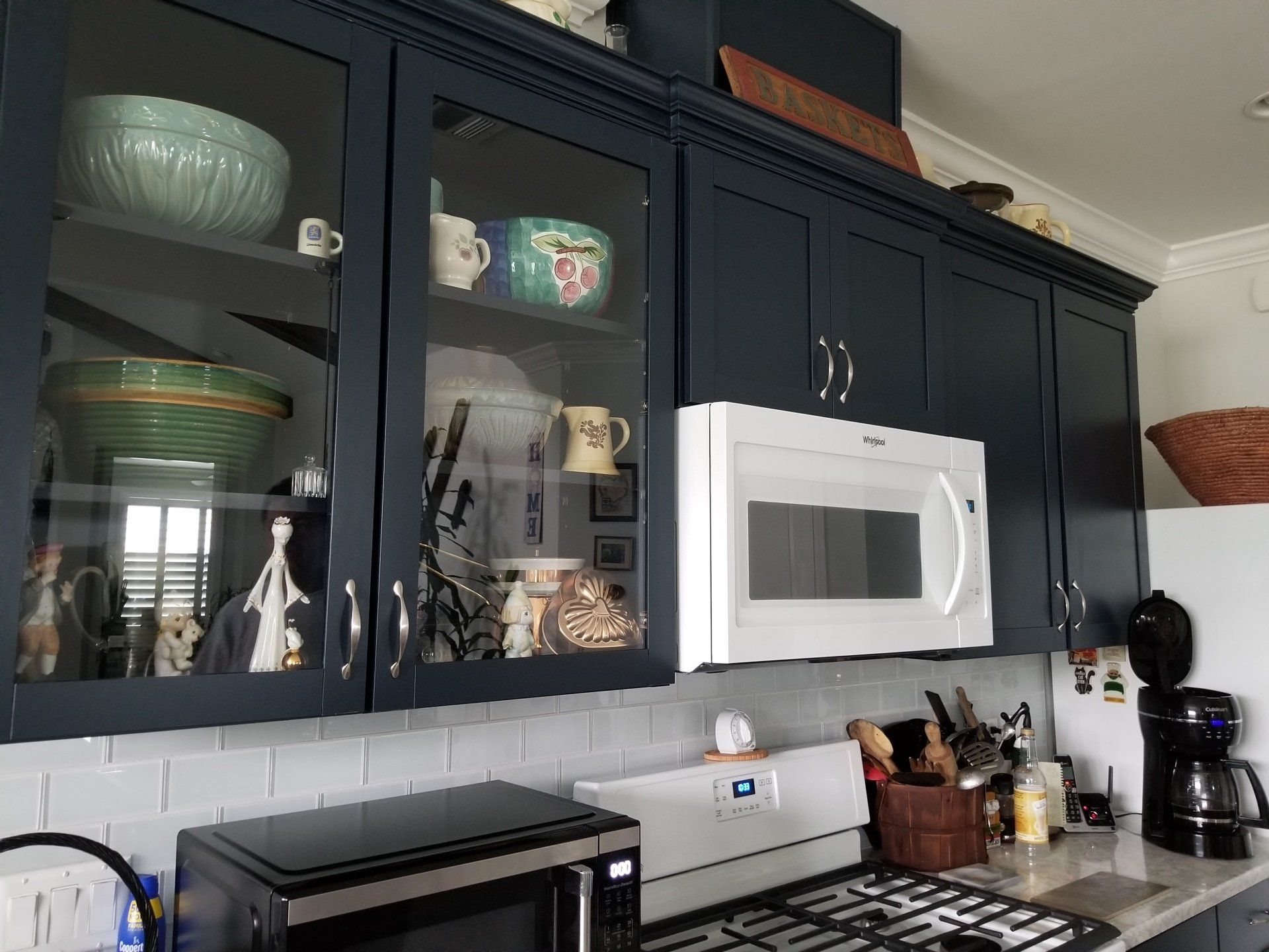 cabinetry on the top of the stove
