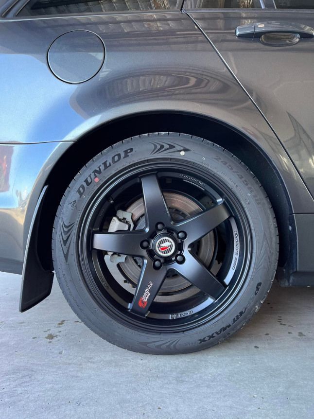 A Close Up Of A Car Wheel With A Dunlop Tire On It — Apex Automotive Detailing In Lismore, NSW