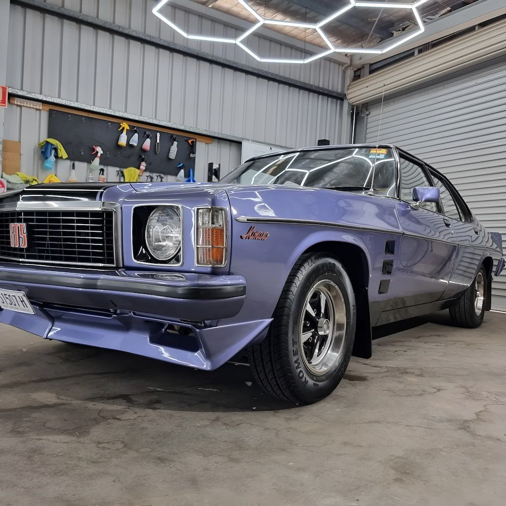A Purple Car Is Parked In A Car Paint Protection — Apex Automotive Detailing In Lismore, NSW