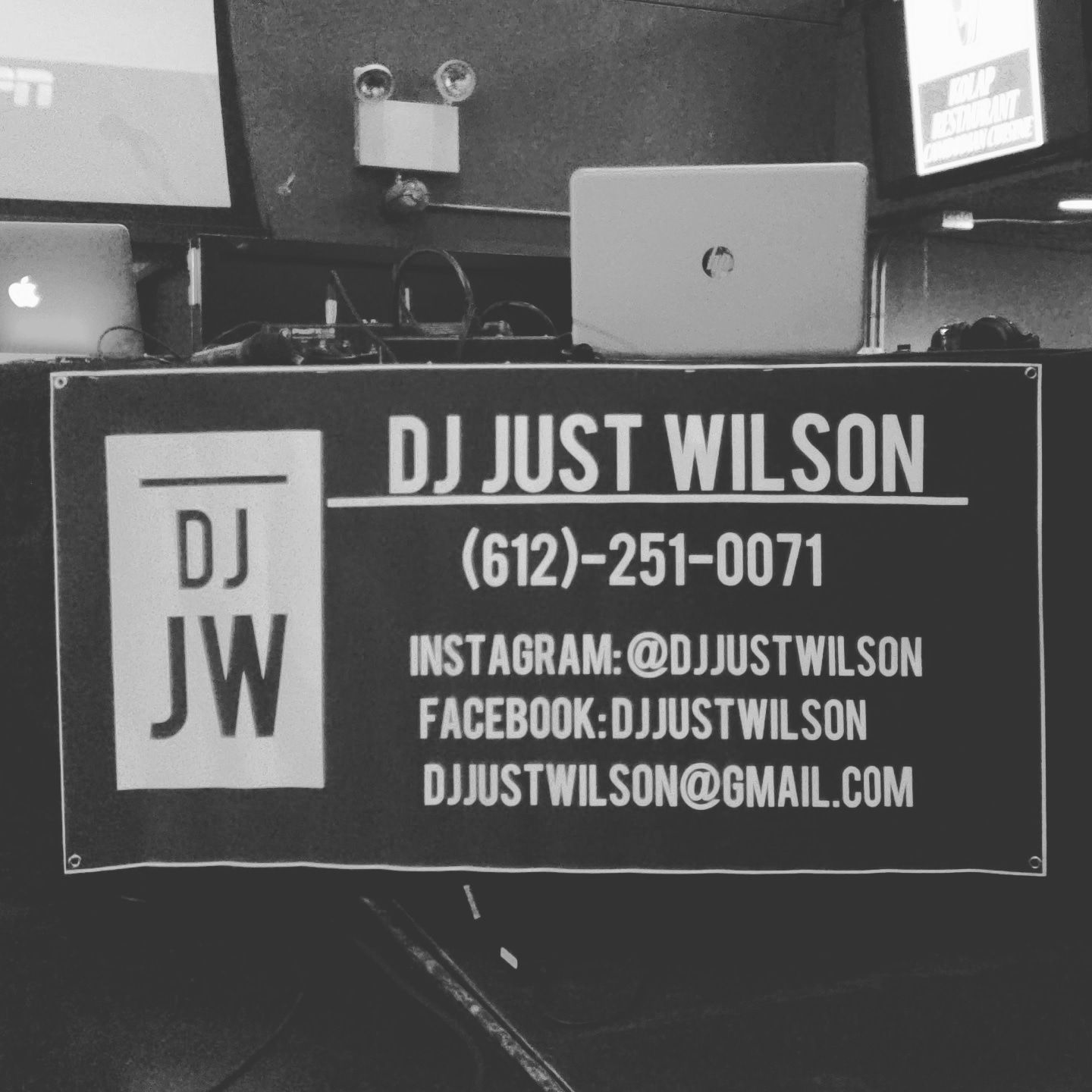 A black and white photo of dj just wilson