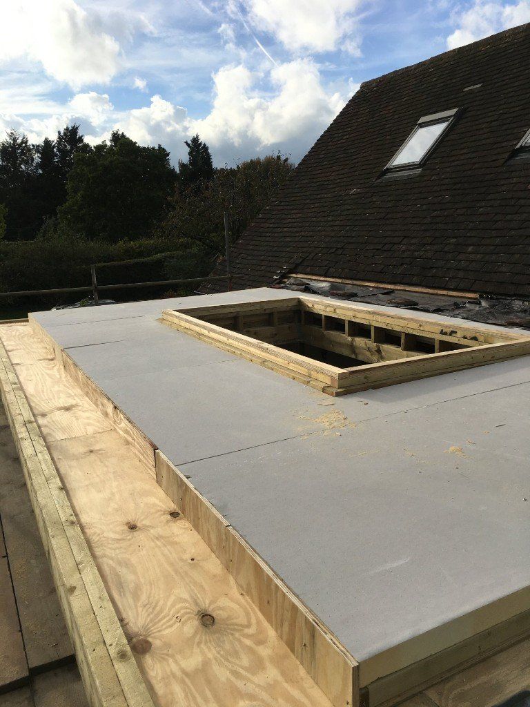 A roof with a hole in it is being built.