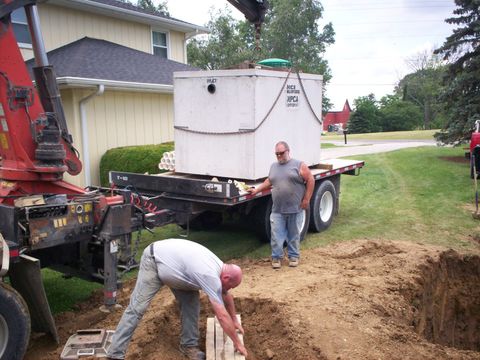 Septic Tank Cleaning — Client Talking With The Septic Contractor In Mansfield, OH