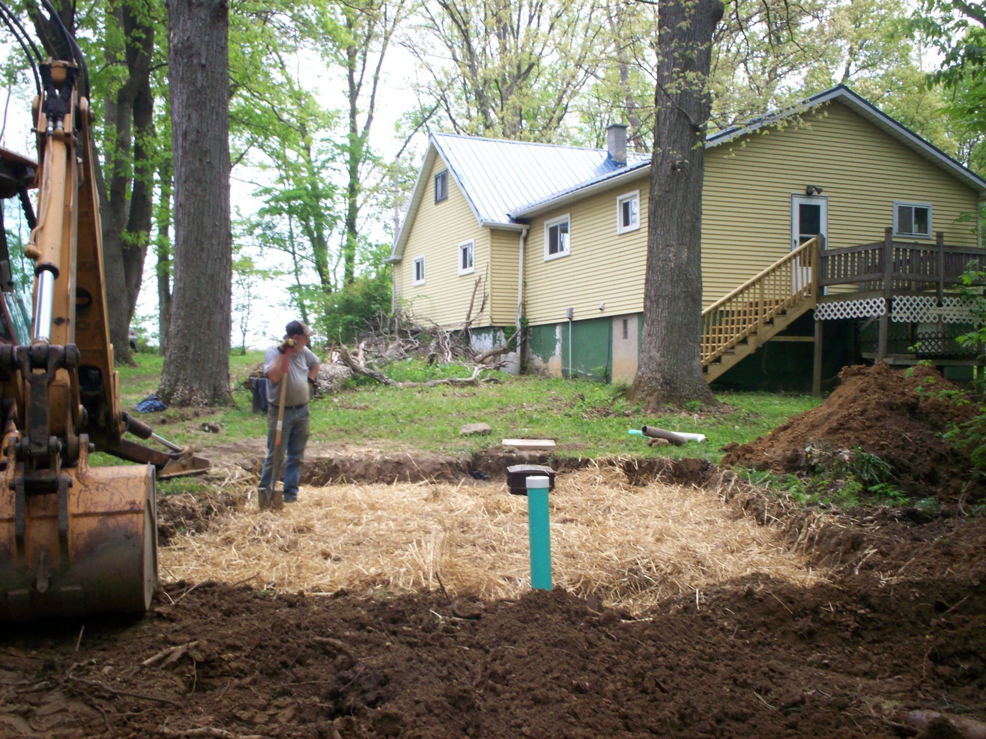 Septic Tank Emergency — Worker Fixing Leak On The Septic Line In Mansfield, OH