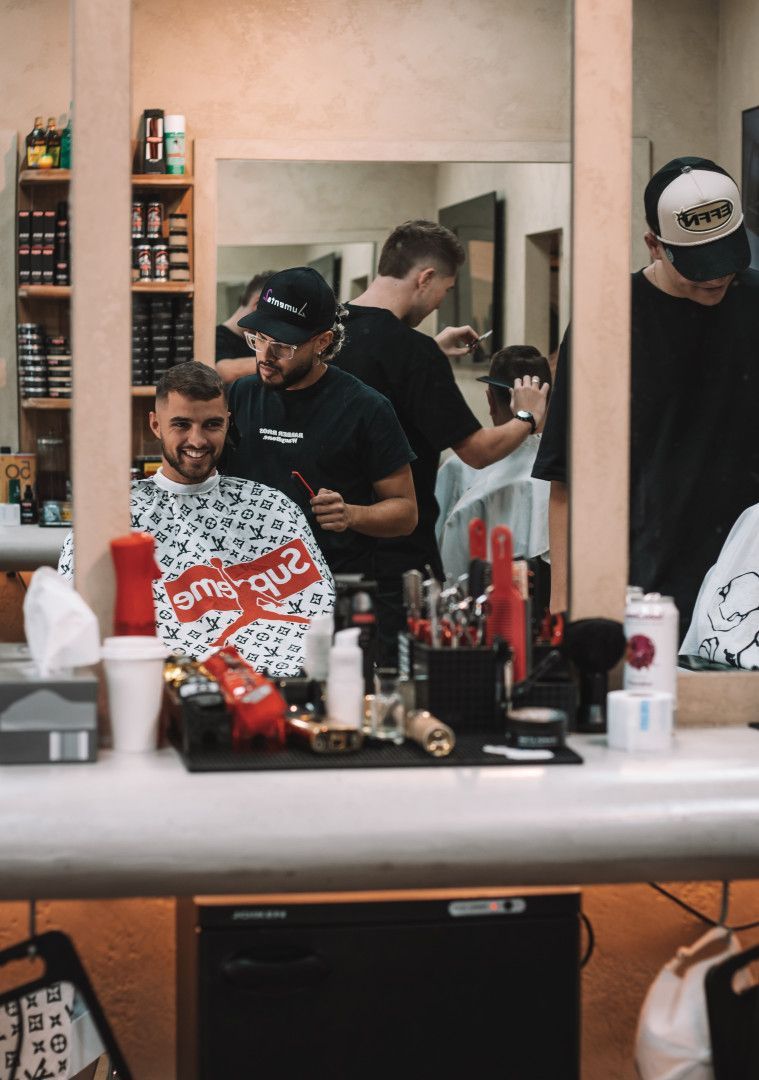 Barber Pouring Milk Into Coffee— Barber Bros & Co - Southport in Southport, QLD