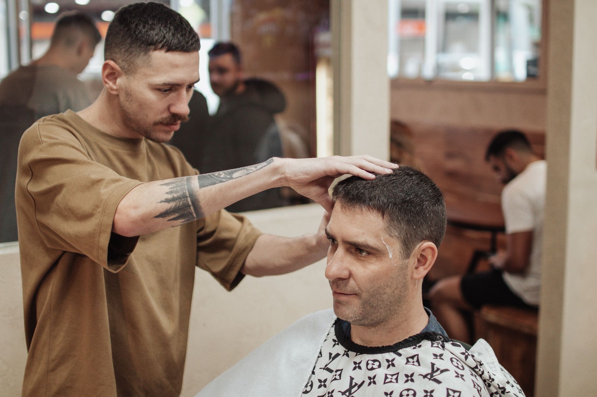 Barber Cutting Man's Hair — Barber Bros & Co - Southport in Broadbeach, QLD