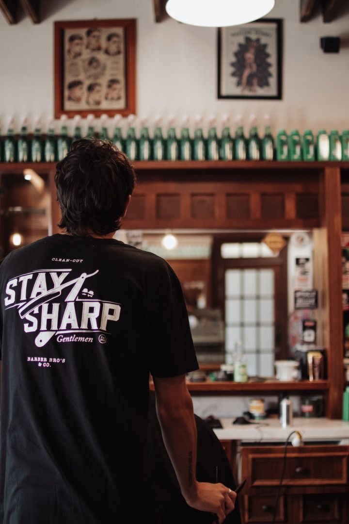 A Peek in a Barber Shop with a Man Getting His Hair Cut — Barber Bros & Co - Southport in Southport, QLD