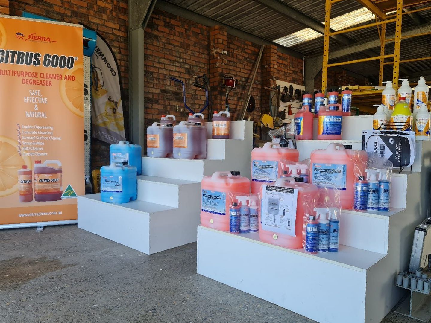 A Display Of Cleaning Products In A Warehouse — Red Shed Hire In Wauchope, NSW