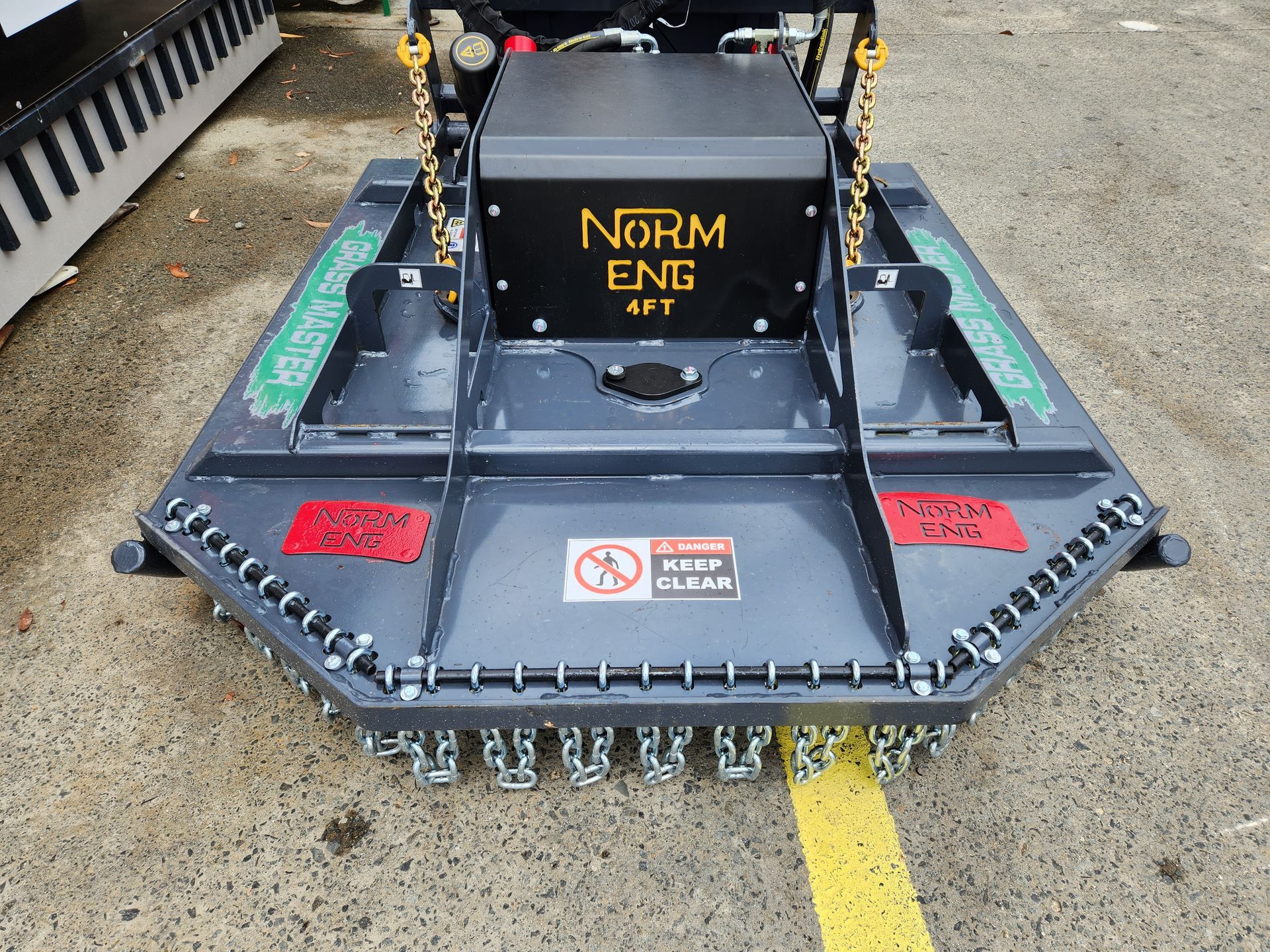 A Lawn Mower With The Word Norm On It — Red Shed Hire In Wauchope, NSW
