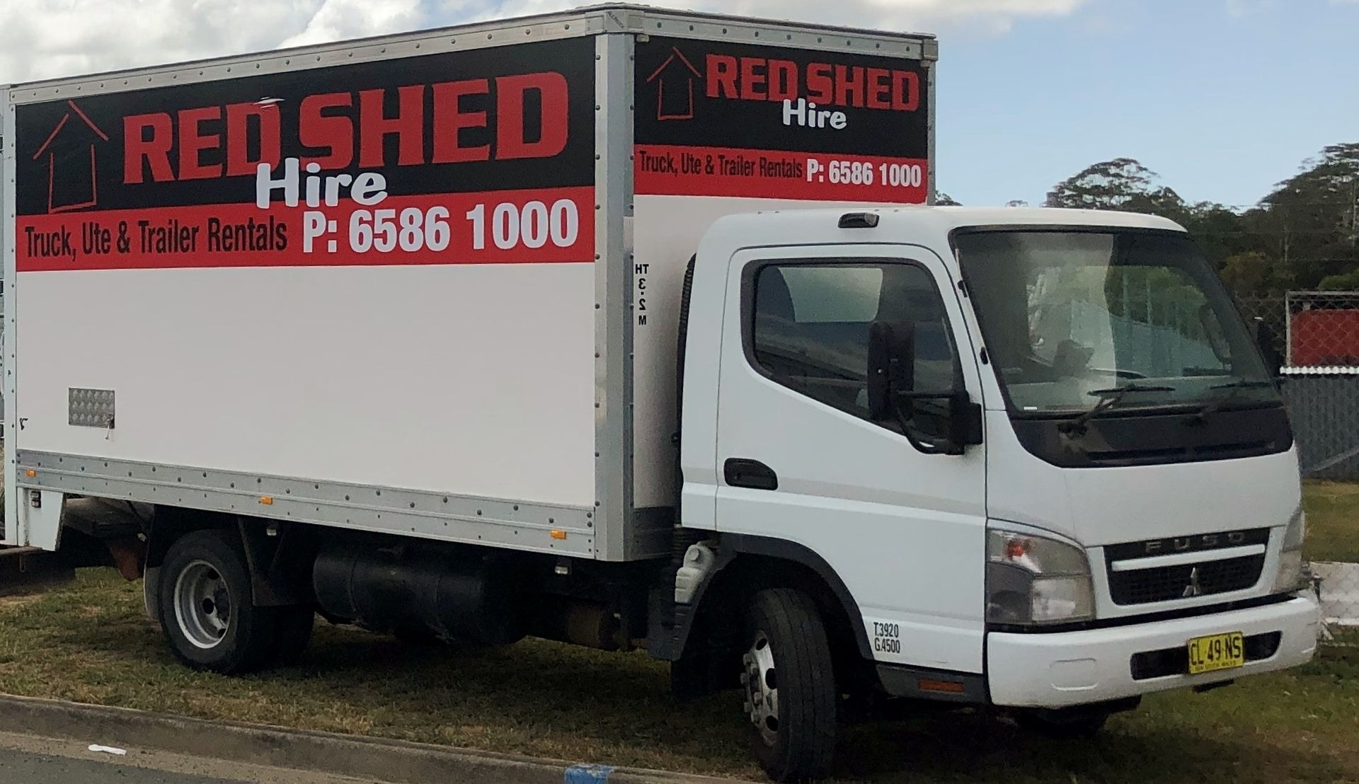 A White Truck With Red Shed Hire Written On The Side — Red Shed Hire In Wauchope, NSW