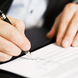 Person Signing A Document